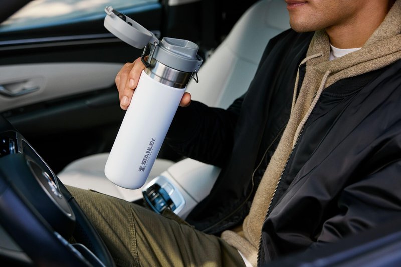 Stanley Quick Flip GO Water Bottle 24 oz | Push Button Lid | Leakproof and Packable for Travel and Sports | Insulated Stainless Steel | BPA-Free | Frost