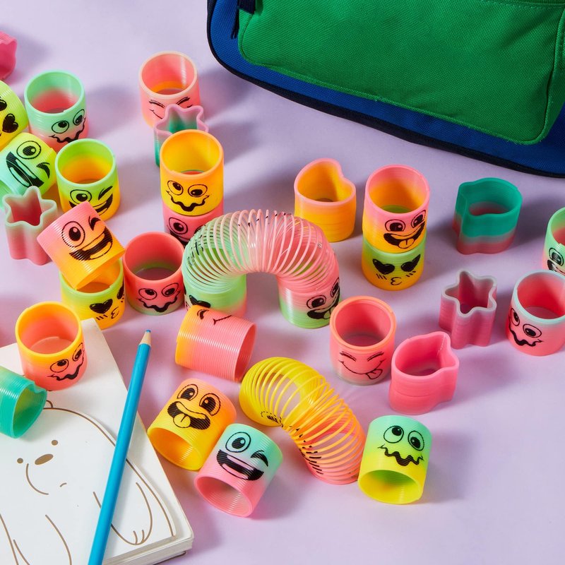 JOYIN 60 Pcs Spring Rainbow Party Favor, Mini Plastic Coil Spring Toy, Fidget Stress Coil Mini Springs Bulk Toys for Carnival Prize Birthday, Classroom Goodie Bag Stuffers