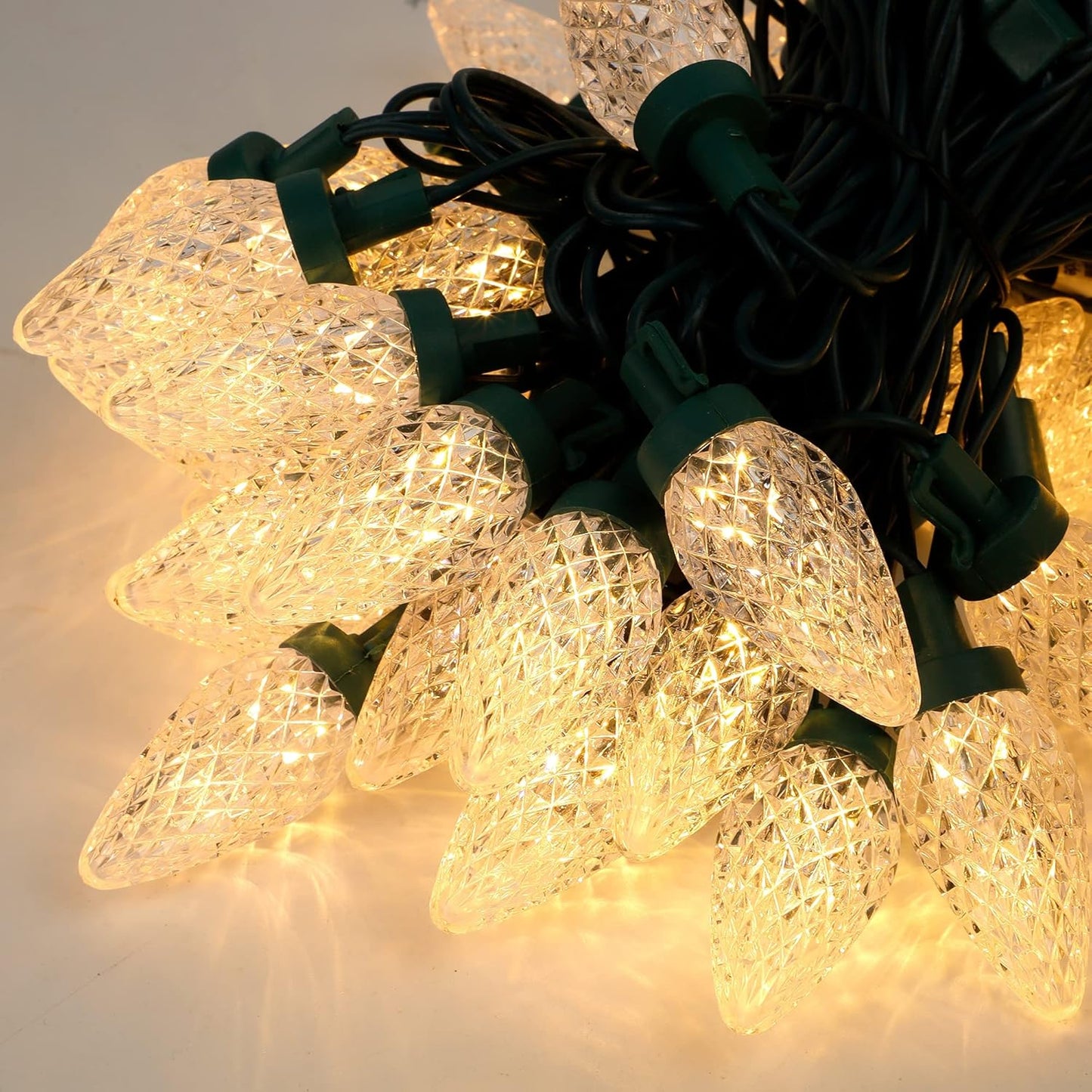 C9 Christmas Lights - 50 LED Faceted String Lights | 24.5 FT Connectable Indoor/Outdoor, Warm White